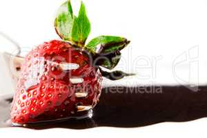 Strawberry with liquid chocolate