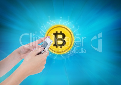 Bitcoin icon and hands holding phone