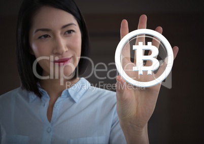 Businesswoman touching bitcoin graphic icon