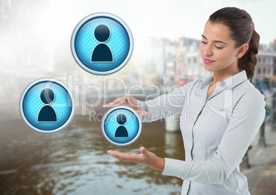 Profile contact icons and Businesswoman with hands palm open in city