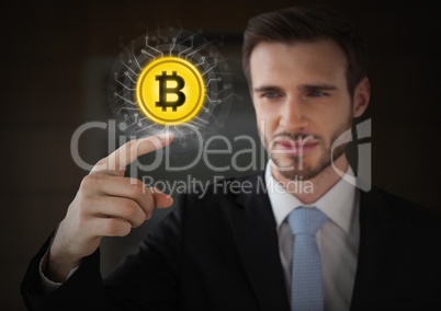 Businessman touching bitcoin graphic icon