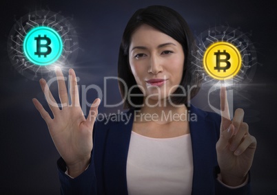 Businesswoman touching bitcoin graphic icons