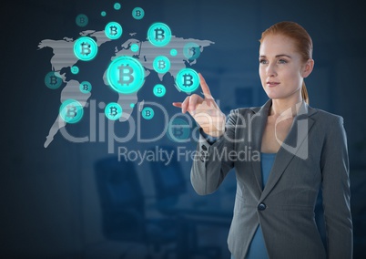 Businesswoman touching bitcoin graphic icons on world map