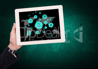 Bitcoin icons and world map on tablet