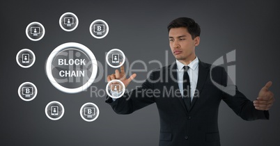 Businessman touching blockchain icon graphics