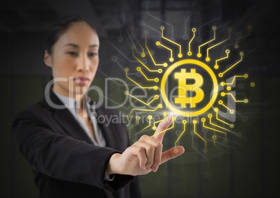 Businesswoman touching bitcoin graphic icon Businesswoman touching bitcoin graphic icon