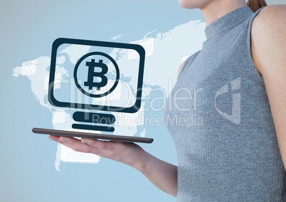 Bitcoin computer icon and woman with tablet