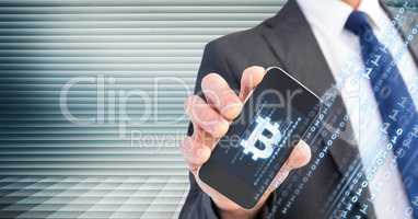 Bitcoin icon on phone in businessman's hand