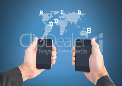 Hands holding two phones with bit coin world map