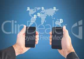 Hands holding two phones with bit coin world map