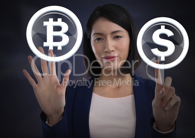 Businesswoman touching bitcoin graphic icon and dollar icon