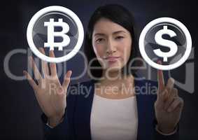 Businesswoman touching bitcoin graphic icon and dollar icon