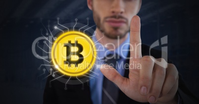 Businessman touching bitcoin graphic icon