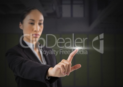 Businesswoman touching air glow