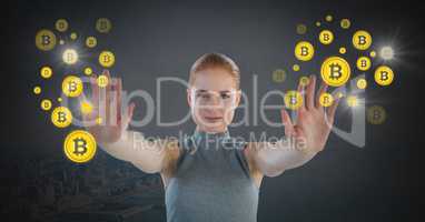 Futuristic Businesswoman touching bitcoin graphic icons