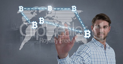 Businessman touching bitcoin graphic icons on world map