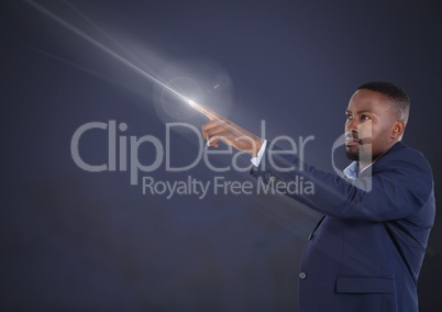 Businessman pointing with air light glow