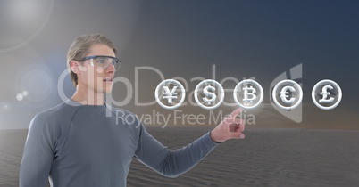 Businessman touching bitcoin graphic icon with money currencies