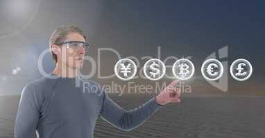 Businessman touching bitcoin graphic icon with money currencies