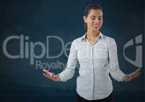 Businesswoman with hands palm open and dark background