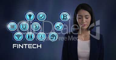 Businesswoman thinking Fintech with various business icons