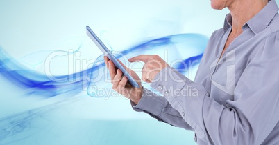 hands holding tablet