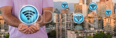 Wi-Fi icons and man with hands palm open in city