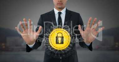 Businessman holding security lock icon