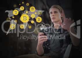 Businessman touching bitcoin graphic icons on world map