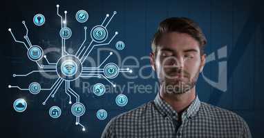 Businessman with eyes closed and various business icons interface