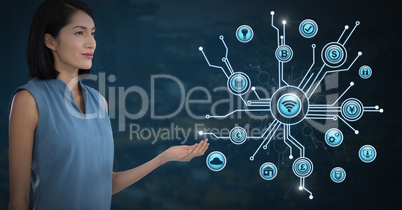 Businesswoman with hands palm open and various business icons interface