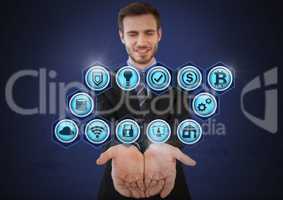 Businessman with hands palm open and various business icons
