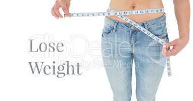 Lose weight text and woman measuring waist