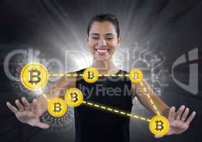 Businesswoman touching bitcoin graphic icons