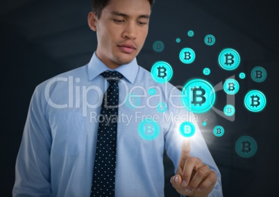 Businessman touching bitcoin graphic icons