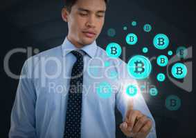 Businessman touching bitcoin graphic icons