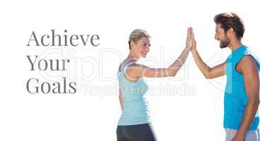 Achieve your goals and fitness couple giving high five