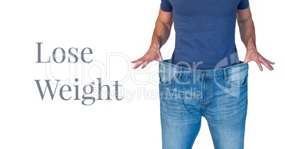 Lose weight text and man with oversized jeans
