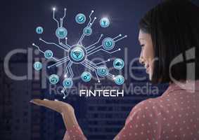 Businesswoman with hands palm open and Fintech with various business icons interface