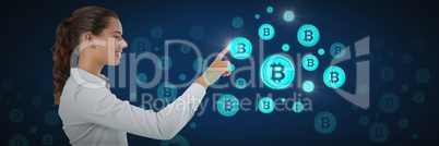 Businesswoman pointing at bitcoin graphic icons