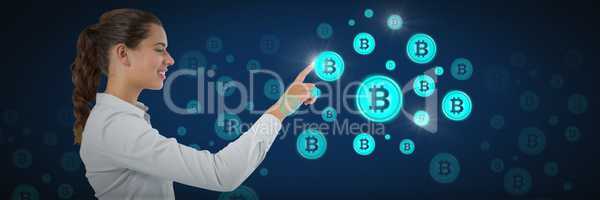 Businesswoman pointing at bitcoin graphic icons
