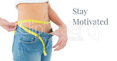 Stay motivated text and woman measuring waist