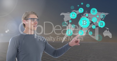 Businessman touching bitcoin graphic icon world map