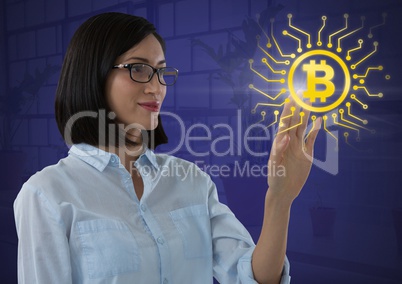 Businesswoman reaching touching bitcoin graphic icon