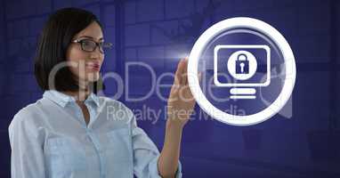 Businesswoman reaching to security lock icon on computer