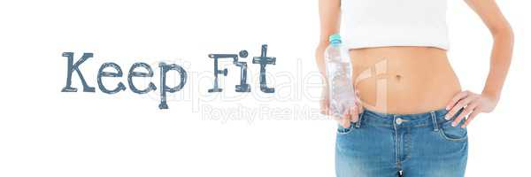 Keep fit and slim woman holding water bottle