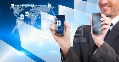 Bitcoin network on wolrd map and businessman holding phones
