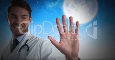 Doctor man holding hand open with moon