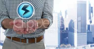 Electric lightning icon and Businessman with hands palm open in city office