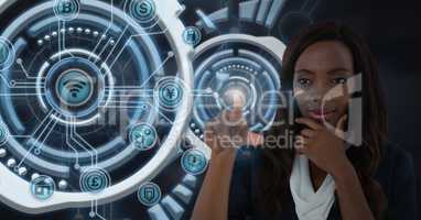 Businesswoman touching futuristic interface
